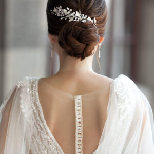 bride-in-wedding-dress-from-behind-with-glam-bun-h-2023-02-10-09-52-52-utc